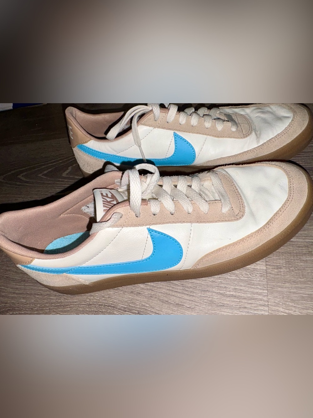 Nike White Sneakers with Blue Swoosh and Beige Accents